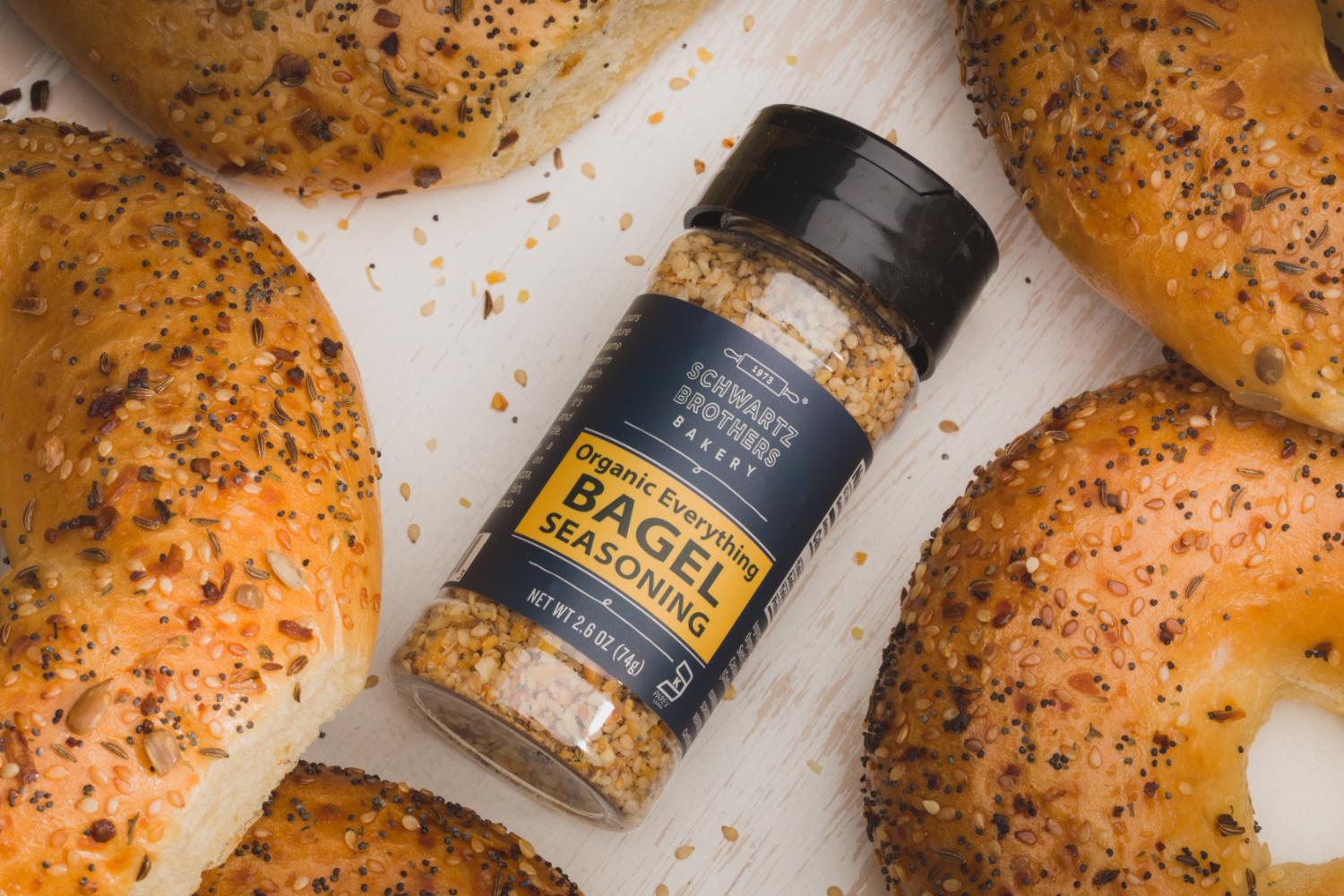container of Everything Bagel Seasoning amongst various bagels